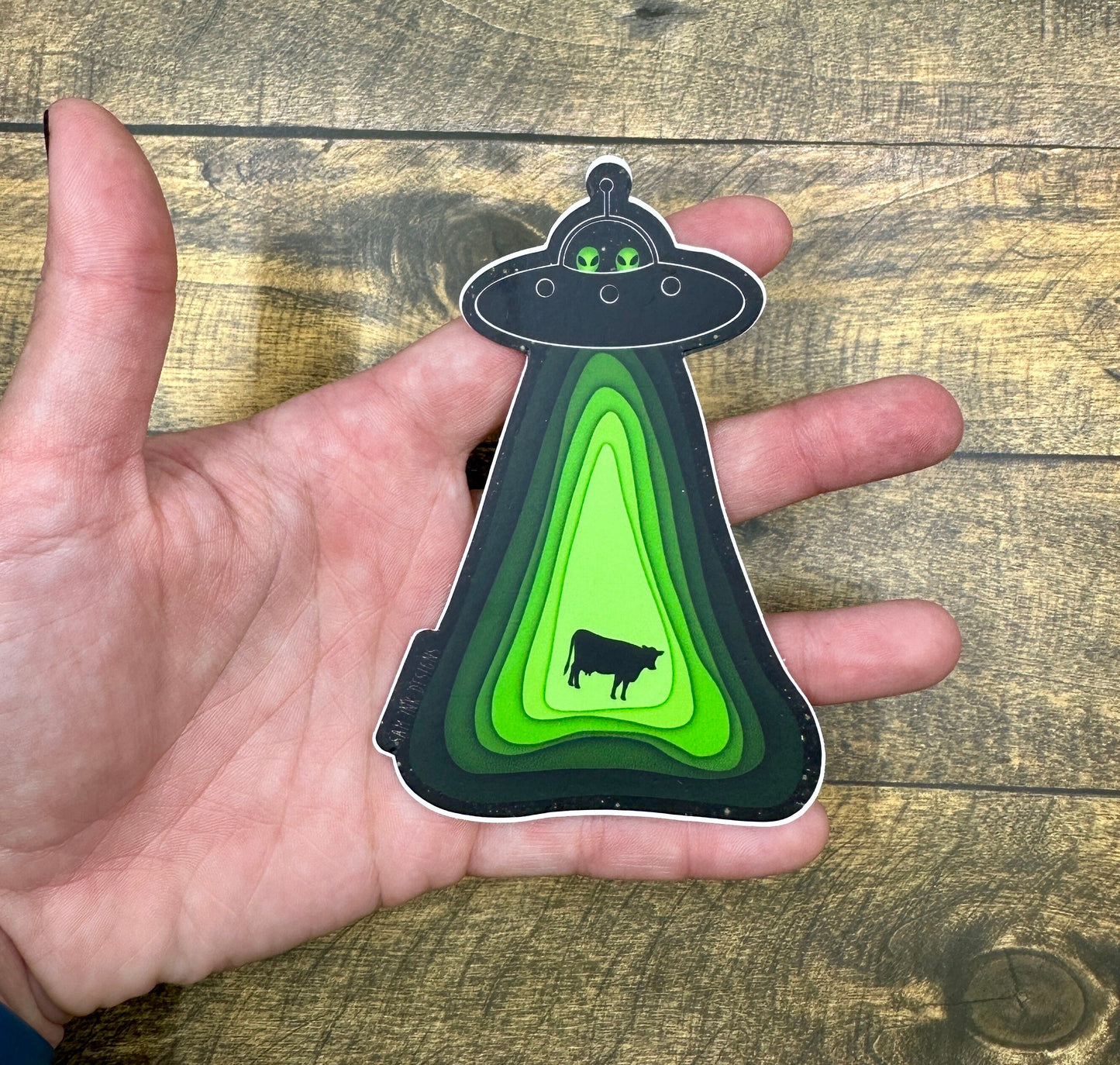 Alien Sticker Flying Soaceship and Abducting a Cow Waterproof Decal, Water Bottle, and Laptop Stickers